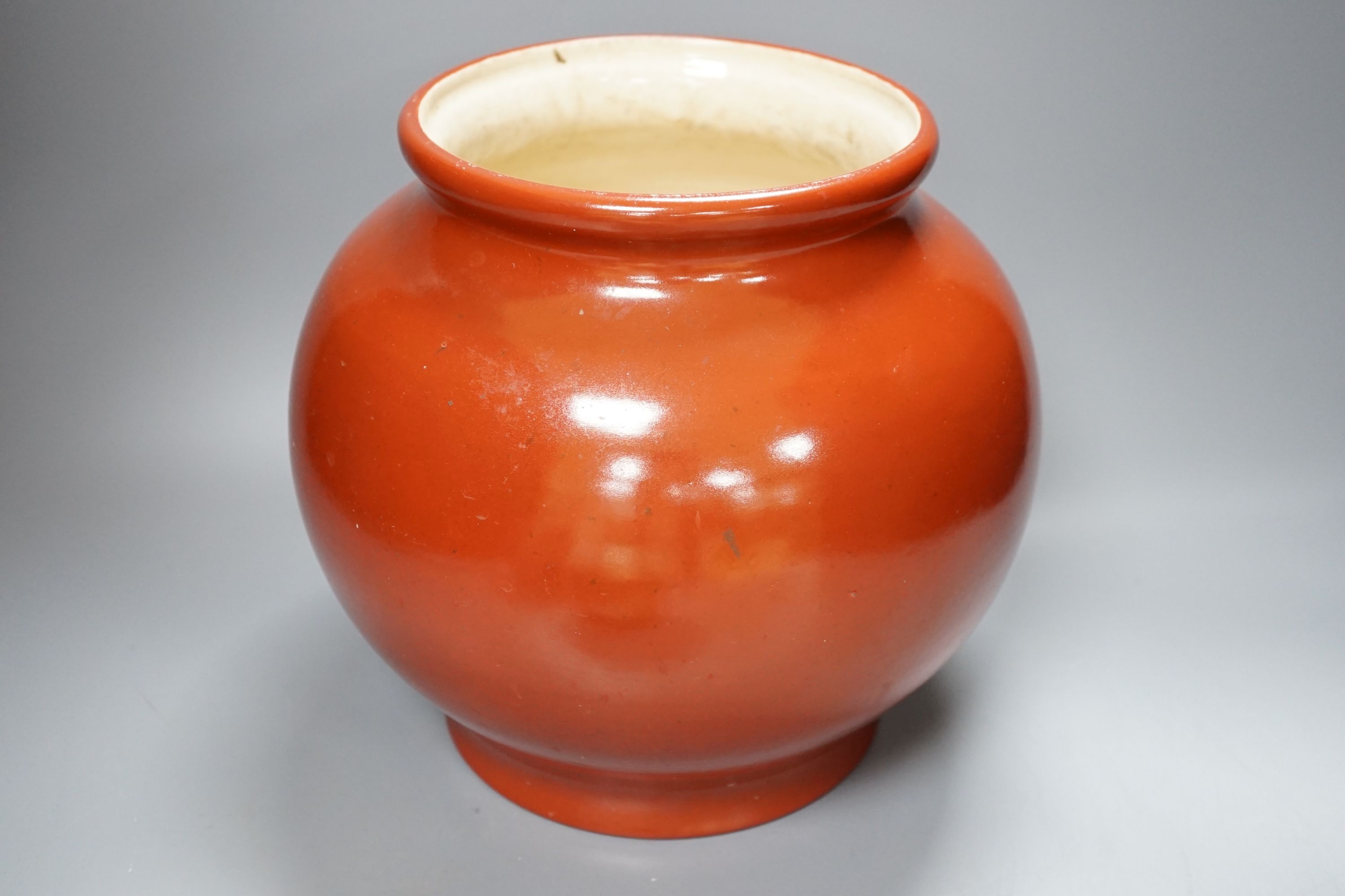 A 19th century Chinese famille rose pot and cover, 15cm diam., together with a decorative Chinese jug and large monochrome china pot